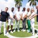MIAMI BEACH, FLORIDA - MAY 04: (L-R) IWC Schaffhausen CEO Christoph Grainger-Herr, Dibia DREAM Founder and CEO Brandon Okpalobi, IWC brand ambassador and seven-time World Champion quarterback Tom Brady, Retired American Football running back Marcus Allen, IWC brand ambassador and seven-time Formula One World Champion Lewis Hamilton, American actor Kathryn Newton and Former F1 driver David Coulthard during The Big Pilot Challenge, an entertaining charity golf challenge organized by IWC Schaffhausen at the Miami Beach Golf Club on May 4, 2022 in Miami Beach, Florida. (Photo by Alexander Tamargo/Getty Images for IWC Schaffhausen)